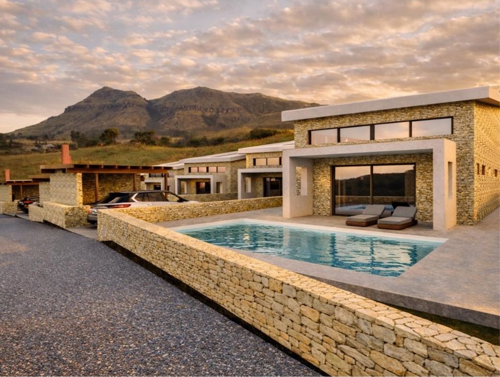 Pasha Villas stone facade and pool with mountain view, Parga